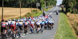Wie zijn de Engelse en Spaanse vertalers en tolken voor de Tour de France 2024 - Ontdek hun bureau, hun profielen en hun passie voor sport
